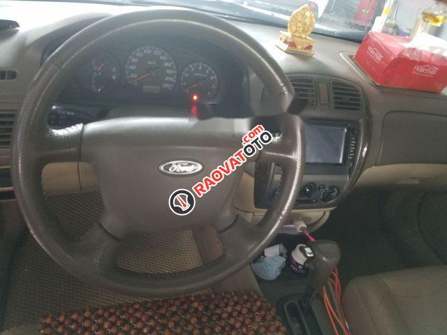 Cần bán gấp Ford Laser Ghia 1.8 sản xuất 2004, màu đen chính chủ-1