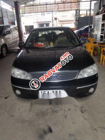 Cần bán gấp Ford Laser Ghia 1.8 sản xuất 2004, màu đen chính chủ-0