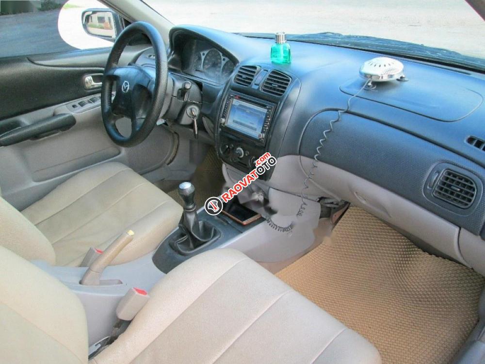 Chính chủ bán Mazda 323 GLX năm 2003, màu đen-4