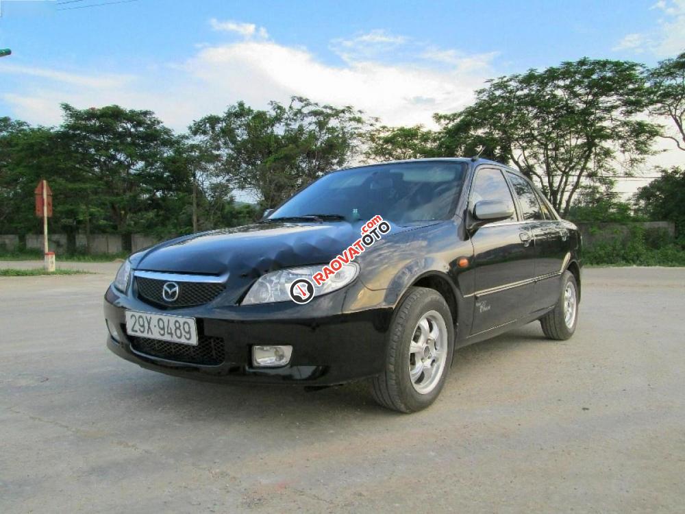 Chính chủ bán Mazda 323 GLX năm 2003, màu đen-0