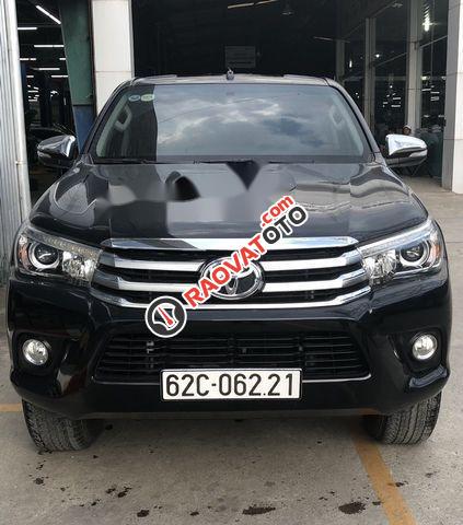 Bán Toyota Hilux 3.0G năm 2015, màu đen như mới, giá 708tr-0