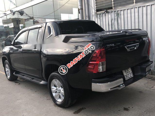 Bán Toyota Hilux 3.0G năm 2015, màu đen như mới, giá 708tr-1