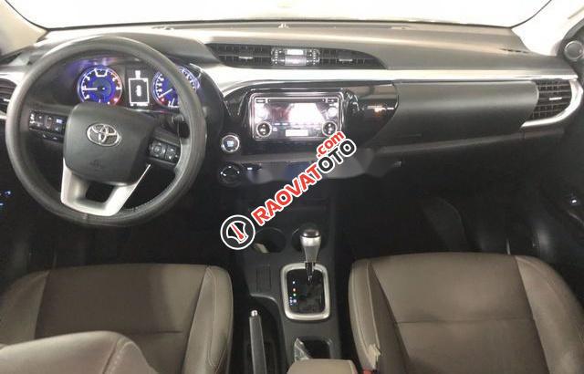 Bán Toyota Hilux 3.0G năm 2015, màu đen như mới, giá 708tr-3