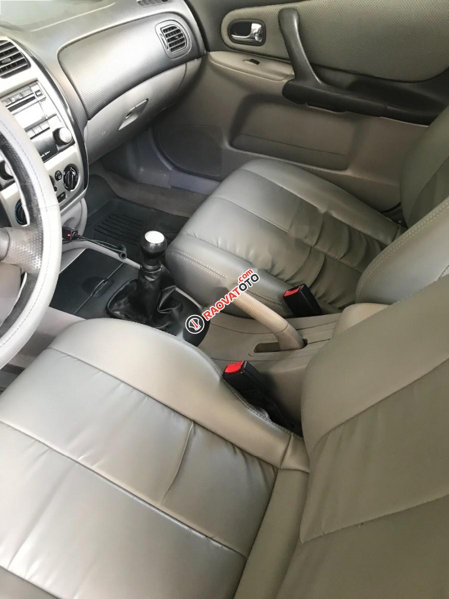 Cần bán lại xe Ford Laser GHIA sản xuất 2003, màu xanh lam, 185tr-4