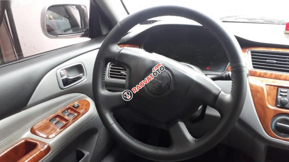 Chính chủ bán Mitsubishi Lancer GLX sản xuất năm 2003, màu bạc-1