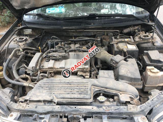 Cần bán xe Ford Laser 1.8AT ĐK 12/2004 -1