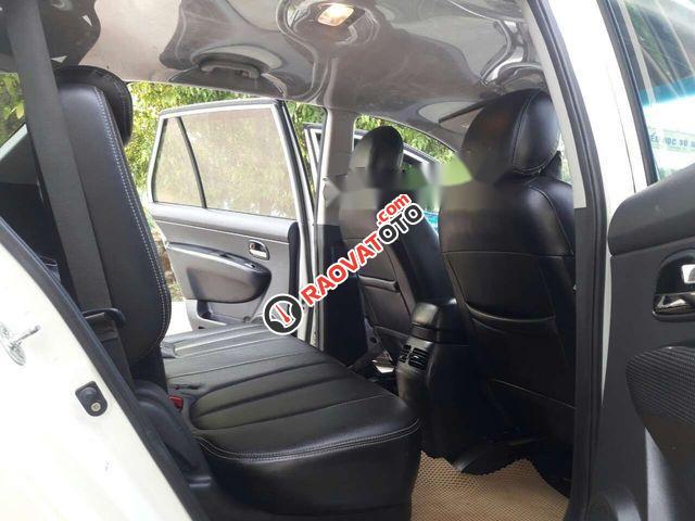 Cần bán Kia Carens EX đời 2016, màu trắng xe gia đình-0