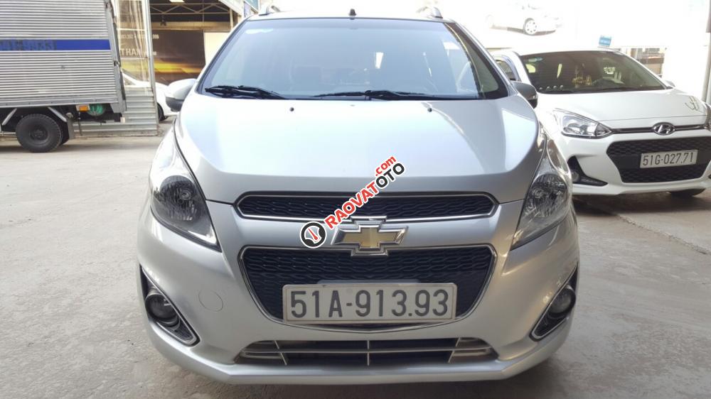 Bán Chevrolet Spark LTZ 1.0AT màu bạc, số tự động sản xuất cuối 2014, biển Sài Gòn, 1 đời chủ chạy đúng 30.000km-0