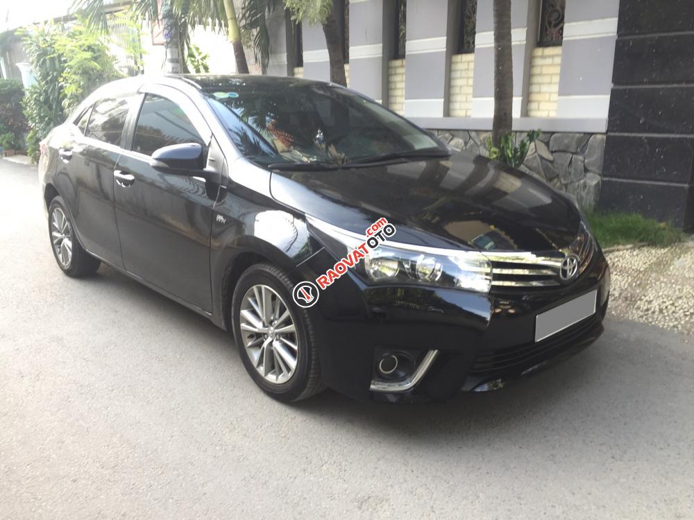 Bán Toyota Corolla Altis G đời 2015 số sàn, màu đen-0