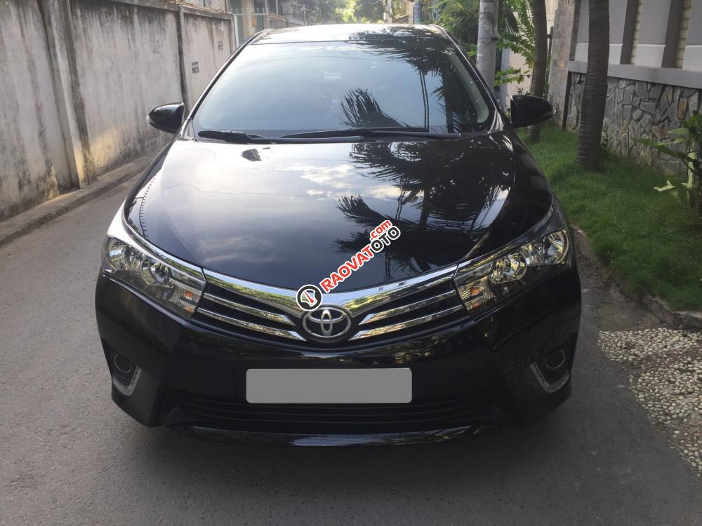 Bán Toyota Corolla Altis G đời 2015 số sàn, màu đen-1