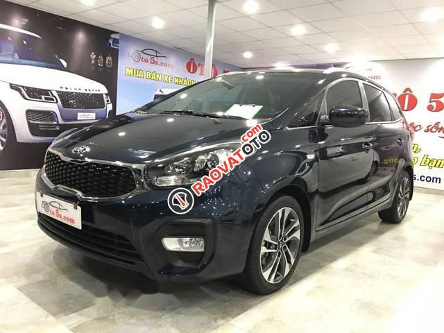 Bán Kia Rondo 7 chỗ, số sàn, màu xanh đen, nội thất kem, form mới mâm xoắn, sản xuất tháng 10/2017-2