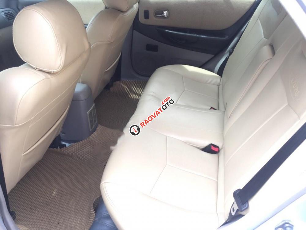 Cần bán xe Ford Laser 1.8MT đời 2002, màu xám-6
