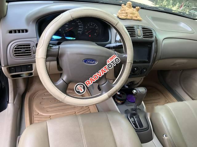 Cần bán lại xe Ford Laser Ghia 1.8 đời 2003, màu đen, giá chỉ 205 triệu-0