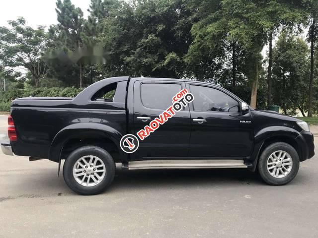 Bán ô tô Toyota Hilux 2.5E năm sản xuất 2014, màu đen, xe nhập Thái Lan-1