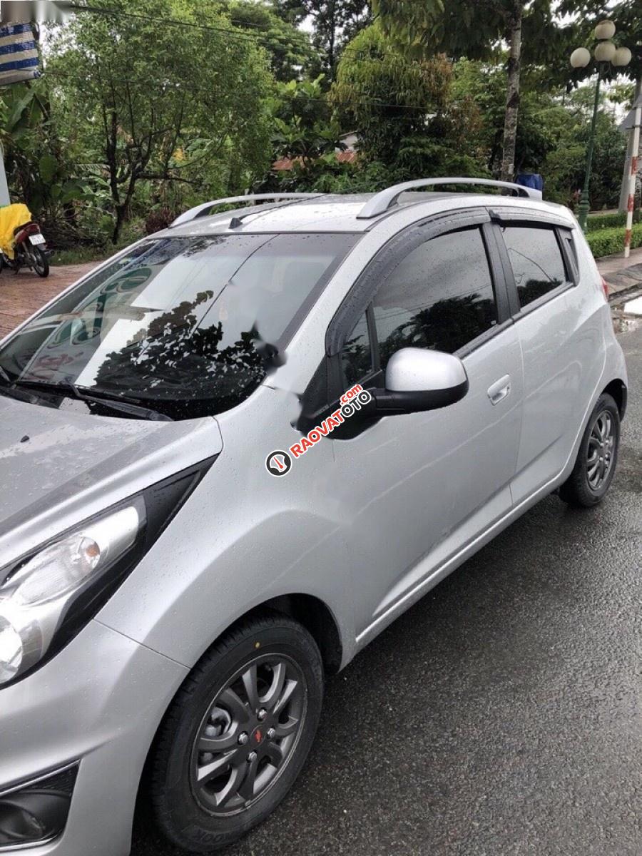 Cần bán gấp Chevrolet Spark LT 1.0 MT đời 2014, màu bạc  -3