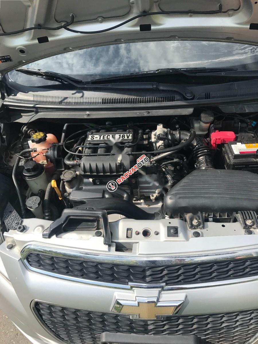 Cần bán gấp Chevrolet Spark LT 1.0 MT đời 2014, màu bạc  -0
