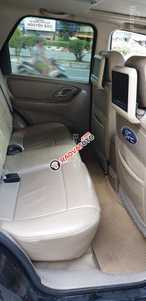 Cần bán xe Ford Escape 3.0, đăng ký 6/2005, màu đen, xe gia đình đi kỹ-9