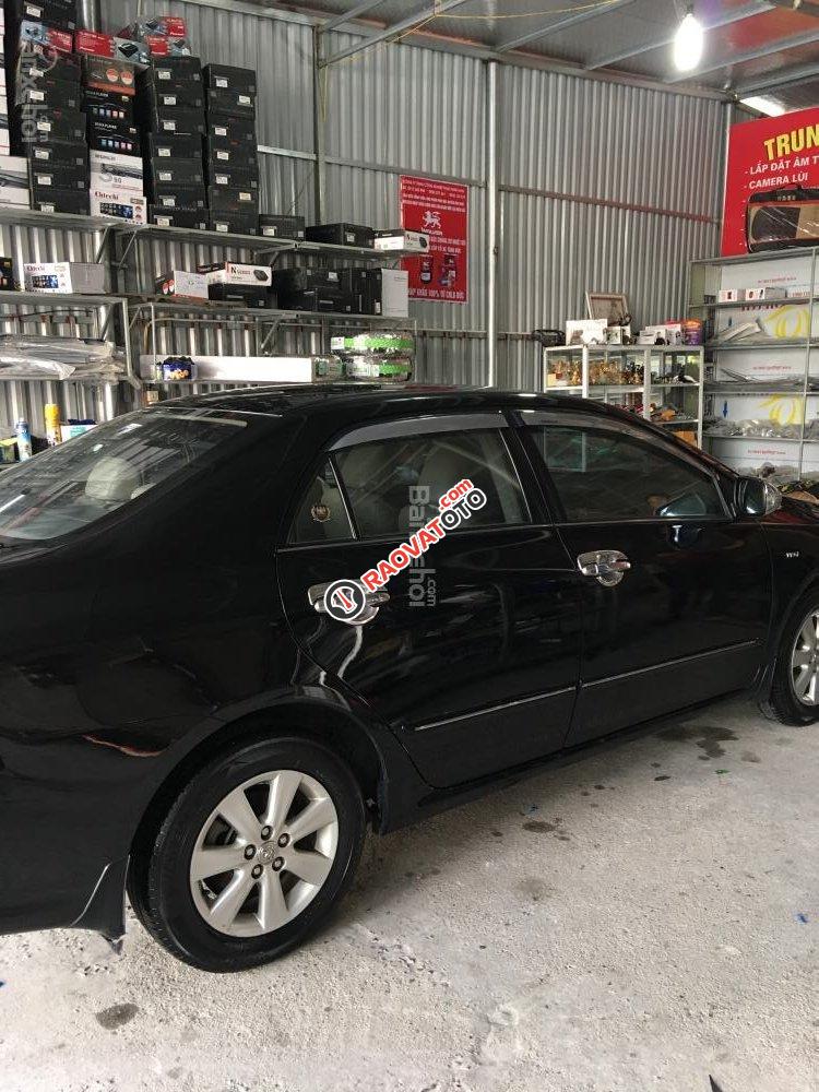 Cần bán lại xe Toyota Corolla altis 1.8G sản xuất 2010, màu đen xe gia đình-1