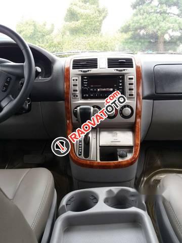 Cần bán xe Kia Carnival GS sản xuất 2009, màu vàng số tự động giá cạnh tranh-2