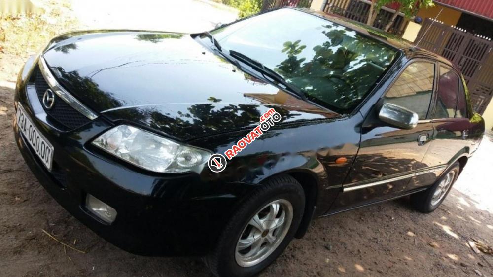 Bán Mazda 323 Classic GLX 2004, màu đen chính chủ -3
