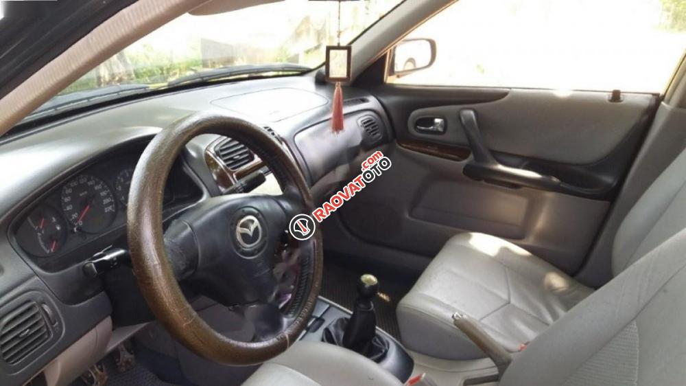 Bán Mazda 323 Classic GLX 2004, màu đen chính chủ -4
