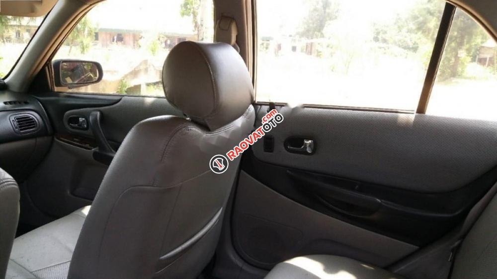 Bán Mazda 323 Classic GLX 2004, màu đen chính chủ -6
