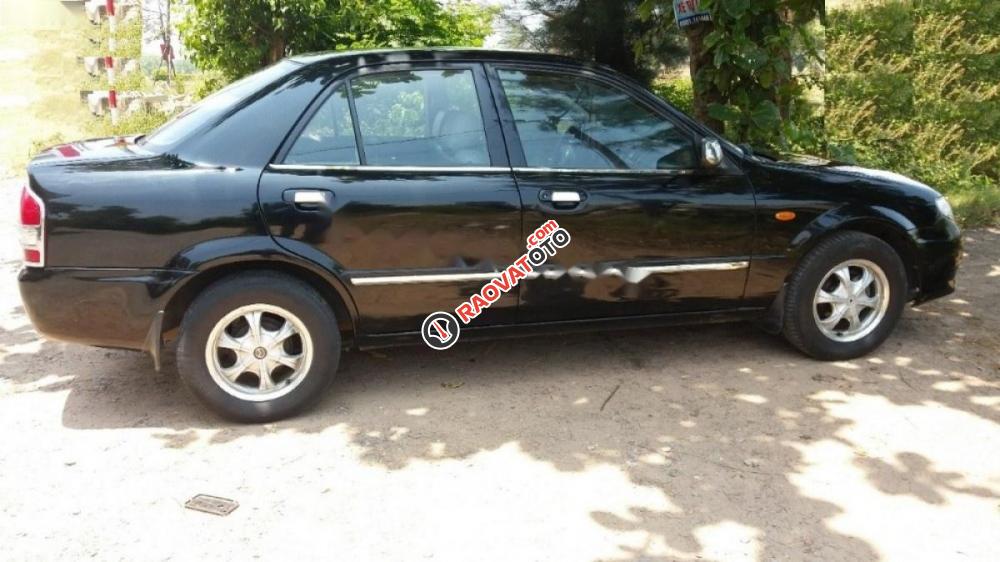 Bán Mazda 323 Classic GLX 2004, màu đen chính chủ -0
