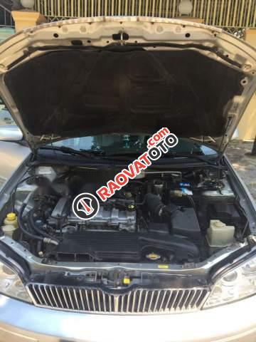 Cần bán gấp Ford Laser GHIA 1.8 2003, màu bạc số sàn, 203tr-1