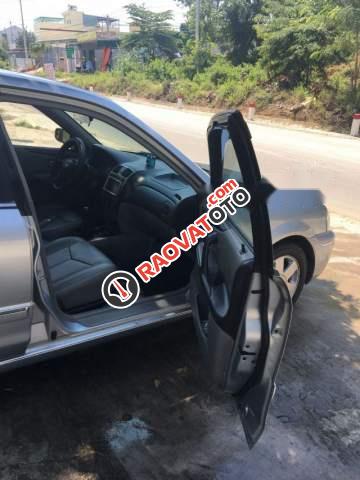 Cần bán gấp Ford Laser GHIA 1.8 2003, màu bạc số sàn, 203tr-2