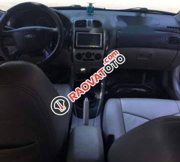 Cần bán gấp Ford Laser GHIA 1.8 2003, màu bạc số sàn, 203tr-0