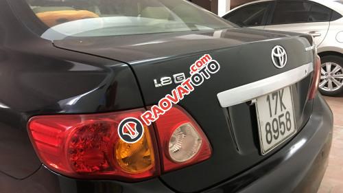 Cần bán Toyota Corolla altis 1.8 MT đời 2009, màu đen -1