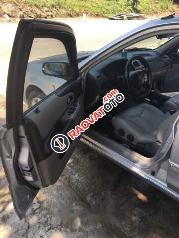 Bán xe Ford Laser GHIA 1.8 2003, màu bạc chính chủ, 189.5tr-2