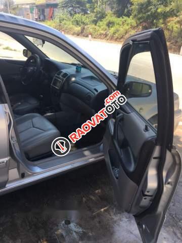 Bán xe Ford Laser GHIA 1.8 2003, màu bạc chính chủ, 189.5tr-1