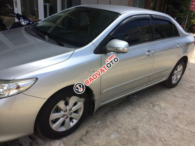 Chính chủ bán xe Toyota Corolla altis 1.8 G đời 2009, màu bạc-0