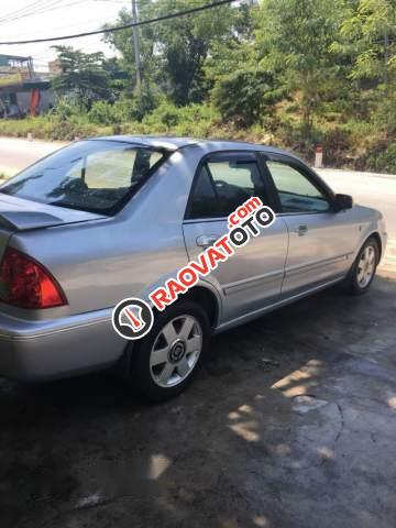 Bán xe Ford Laser GHIA 1.8 2003, màu bạc chính chủ, 189.5tr-4