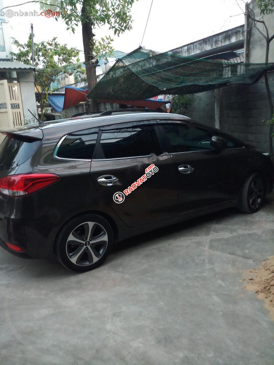 Bán xe Kia Rondo At sản xuất 2015, màu nâu, xe đẹp một đời chủ còn cực mới-4