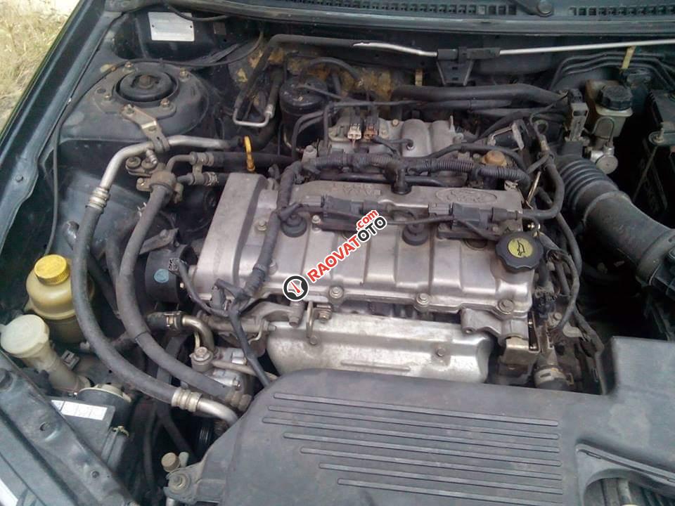 Bán Ford Laser GHIA 2004, màu đen chính chủ, giá 242tr-5