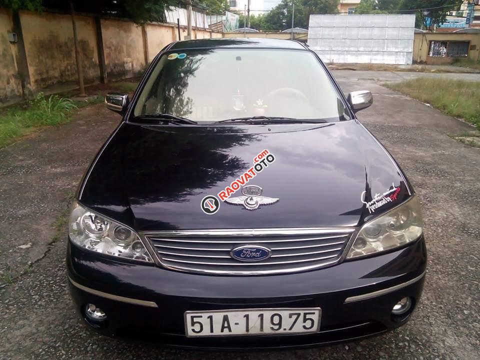 Bán Ford Laser GHIA 2004, màu đen chính chủ, giá 242tr-0