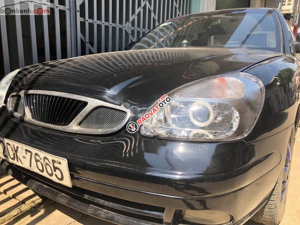 Bán gấp Daewoo Nubira 1.6 MT năm 2002, màu xanh lam, 86tr-0