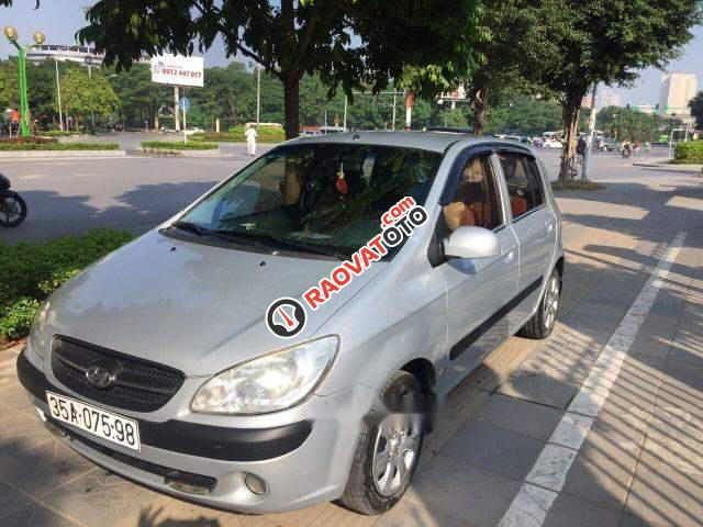 Cần bán xe Hyundai Getz 1.1 đời 2010, màu bạc chính chủ-1