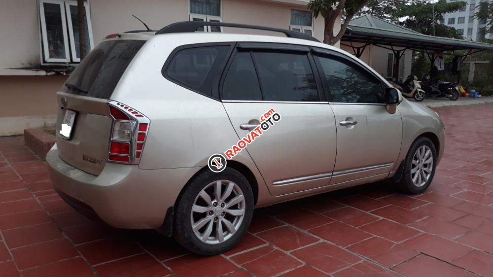 Gia đình cần bán Kia Carens đời 2011, bản đủ, máy 2.0,cửa nóc, màu vàng cát-0
