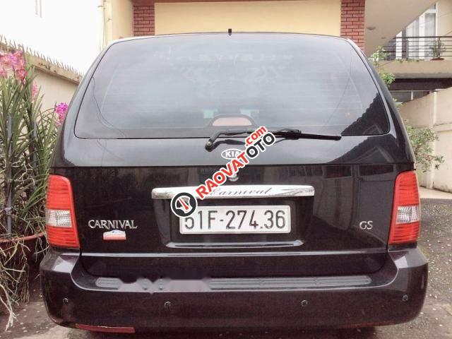 Cần bán xe Kia Carnival GS năm 2009, màu đen số tự động, giá 325tr-1