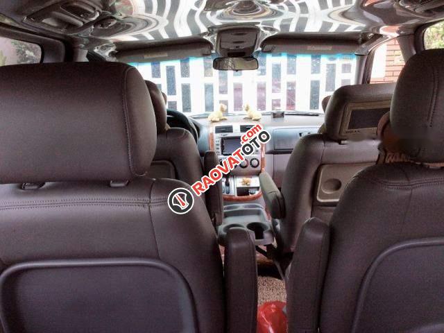 Cần bán xe Kia Carnival GS năm 2009, màu đen số tự động, giá 325tr-5