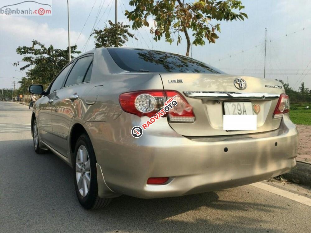 Cần bán xe Toyota Corolla altis 1.8AT sản xuất năm 2011, màu vàng số tự động -1