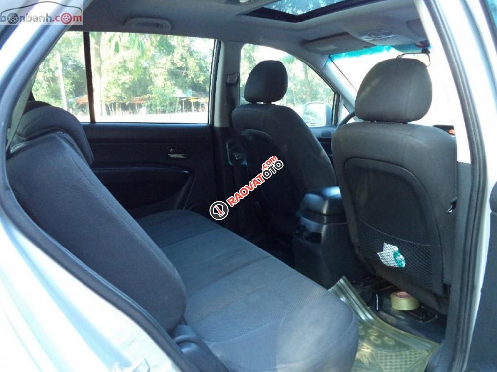 Cần bán Kia Carens SX đời 2012, màu bạc ít sử dụng-5