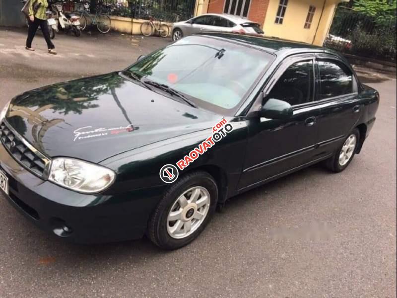 Cần bán gấp Kia Spectra LS 2004, màu đen, xe nhập, số sàn-5