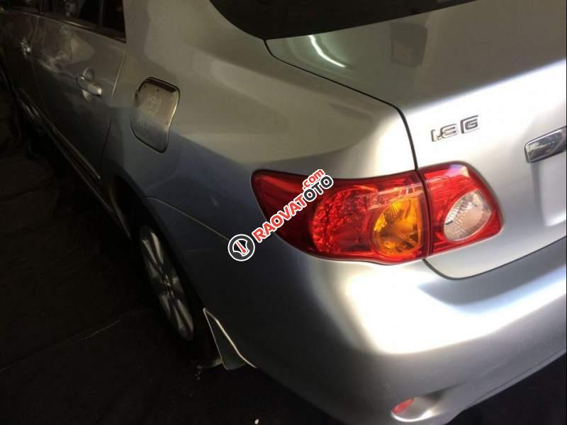 Cần bán lại xe Toyota Corolla altis 1.8G 2009, màu bạc -0