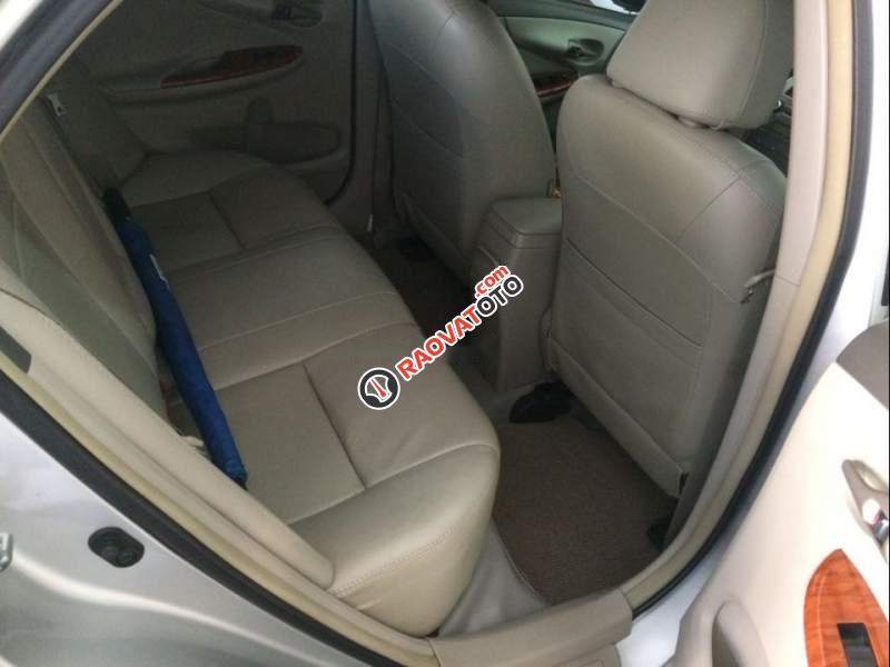 Cần bán lại xe Toyota Corolla altis 1.8G 2009, màu bạc -1