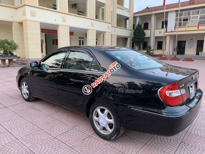 Bán Toyota Camry 2.4 2003, màu đen, giá 29.5tr-5