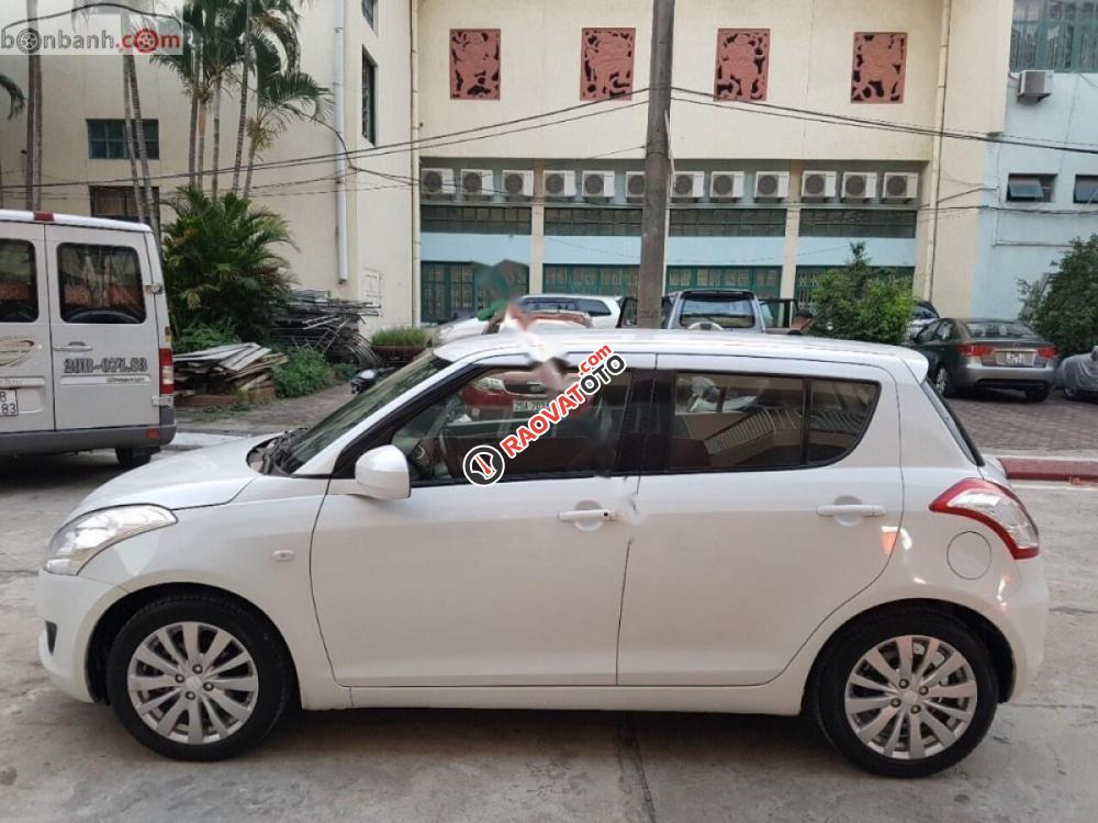 Cần bán xe Suzuki Swift 1.4 AT năm 2013, màu trắng, xe nhập chính chủ, giá 415tr-0